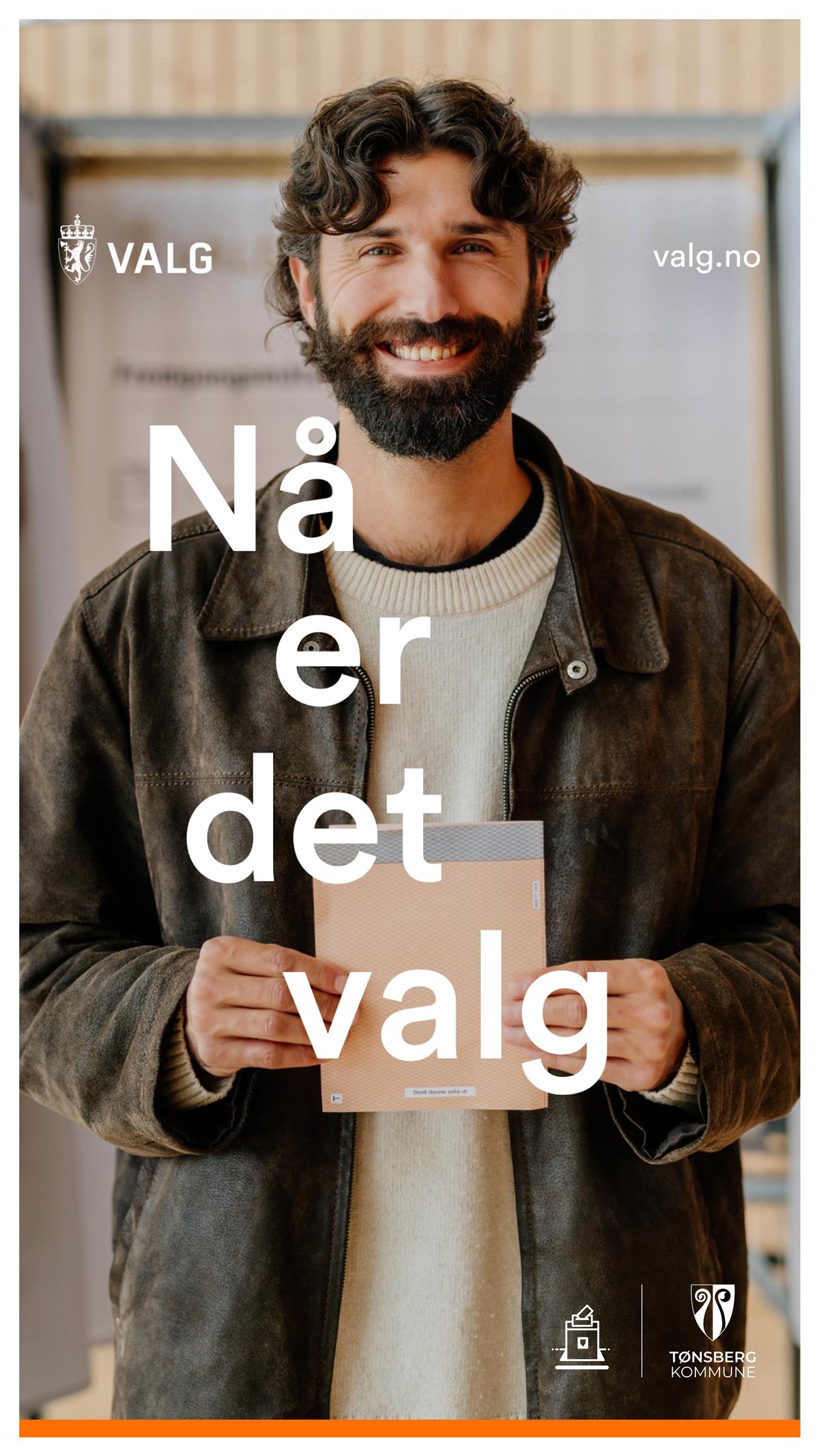 mann med stemmeseddel - Klikk for stort bilde